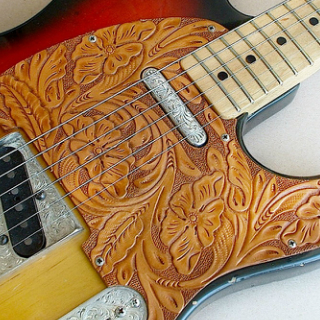Hand-Engraved Metal Guitar Parts